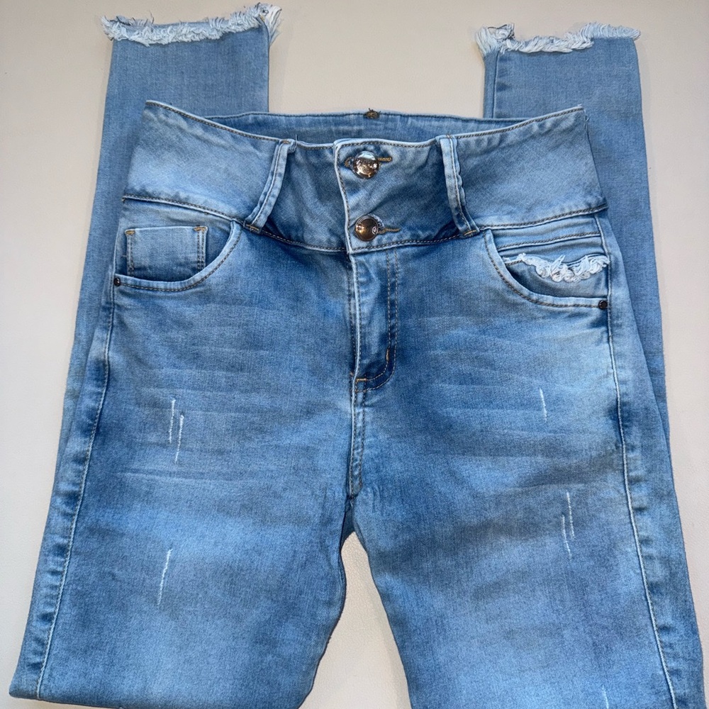 Colombian Light Wash High-Rise Distressed Jeans